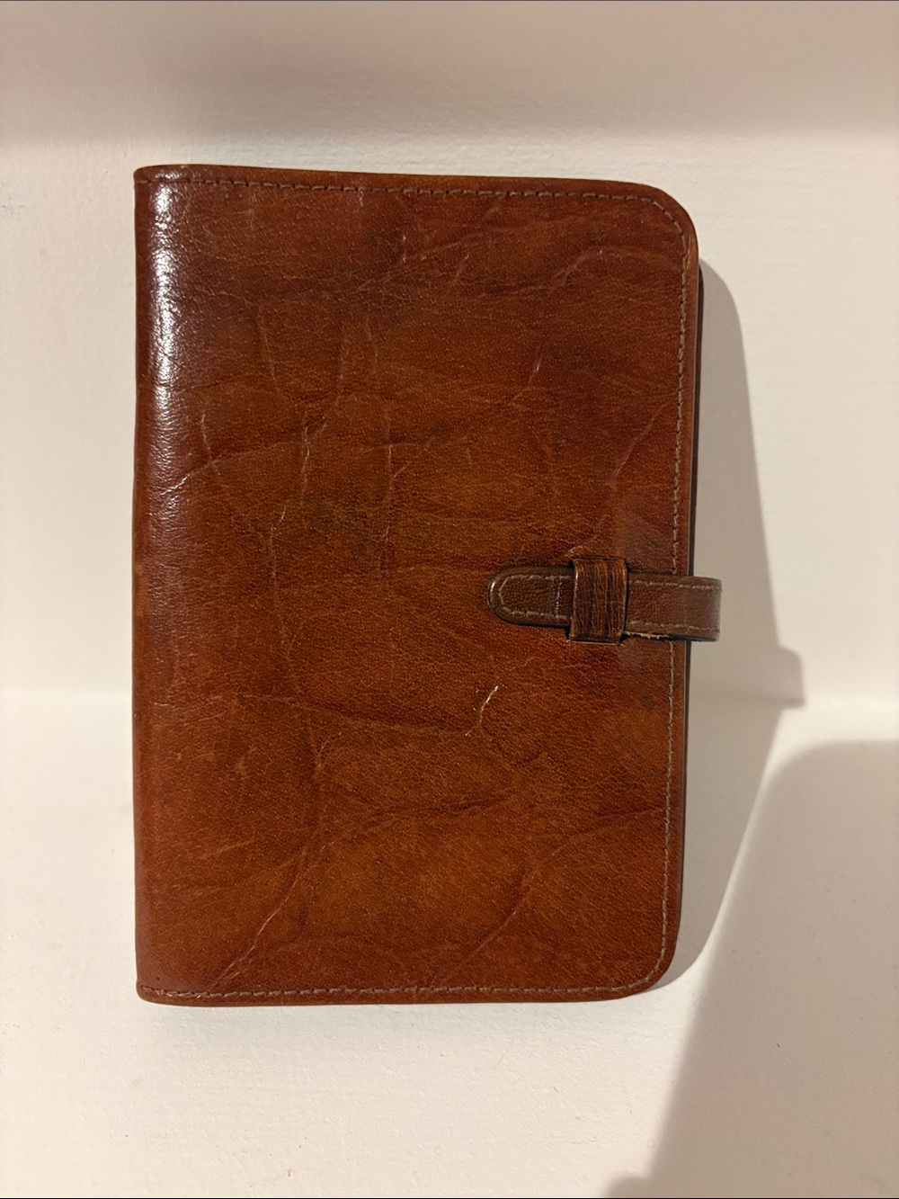 “The Regent Belt Company” England.
Brown Leather Address Book.